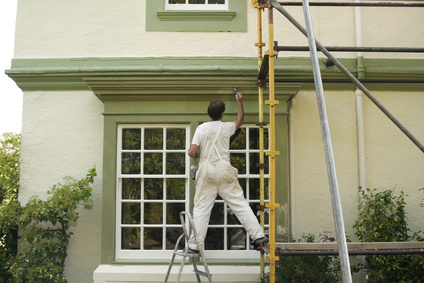 Painter on ladders