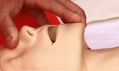 First aid mannequin for mouth-to-mouth practice