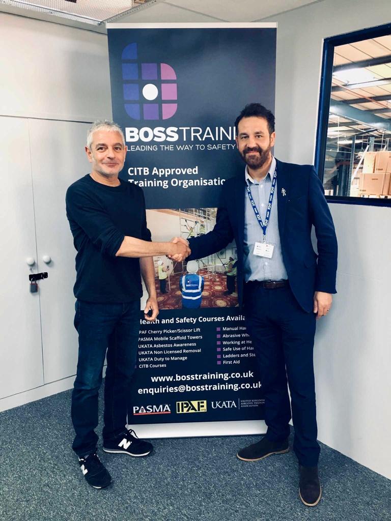 Boss Training Director agreeing sponsorship with FC Halifax Town Director