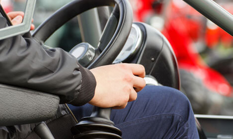 A driver holding the gear stick